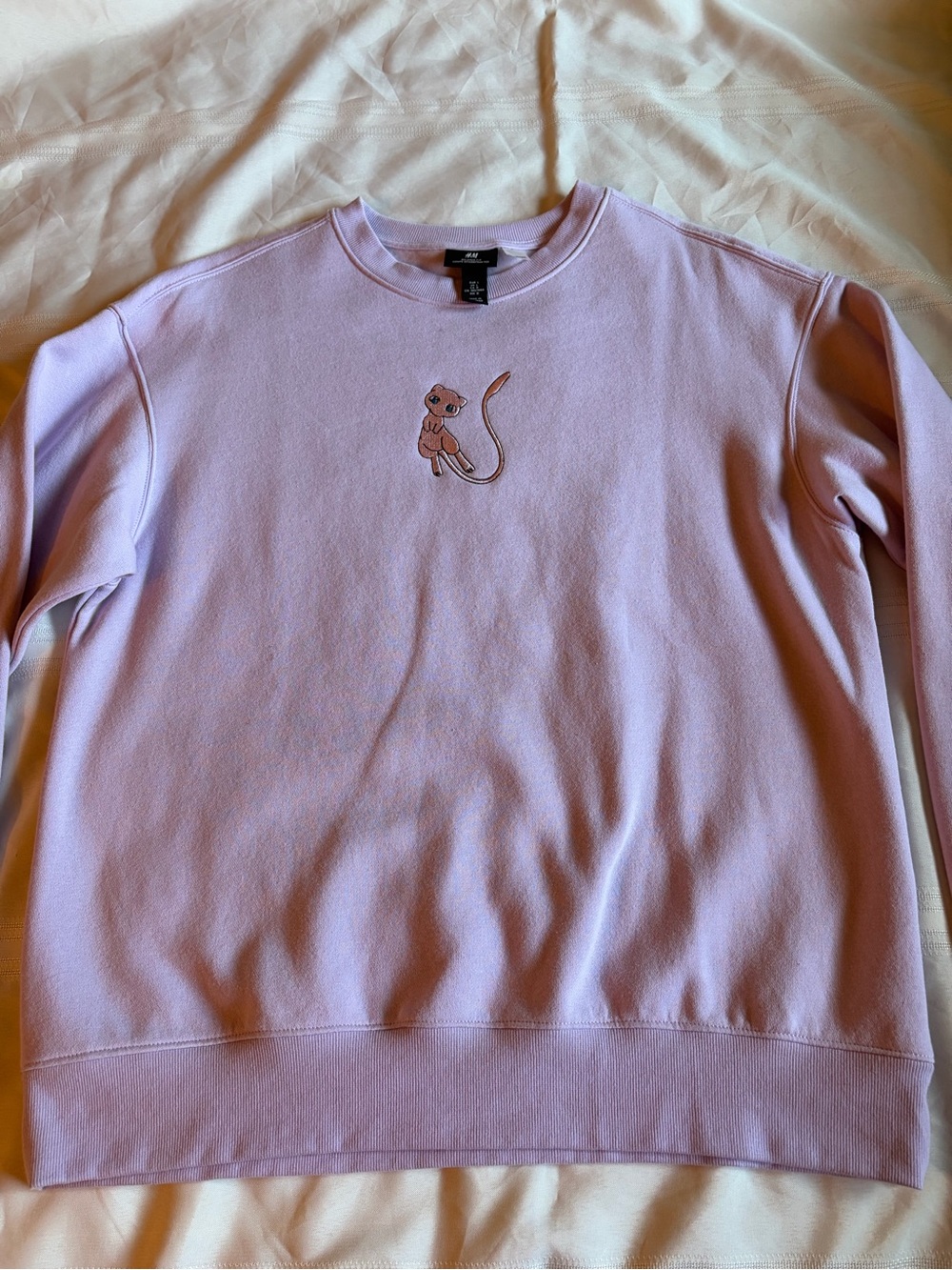 Pokémon Mew H&M Lavender Crewneck Sweater with Embroidered Cat Motif